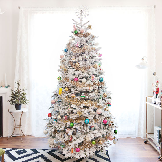Flocked Christmas Tree with Vintage Ornaments via Melodrama