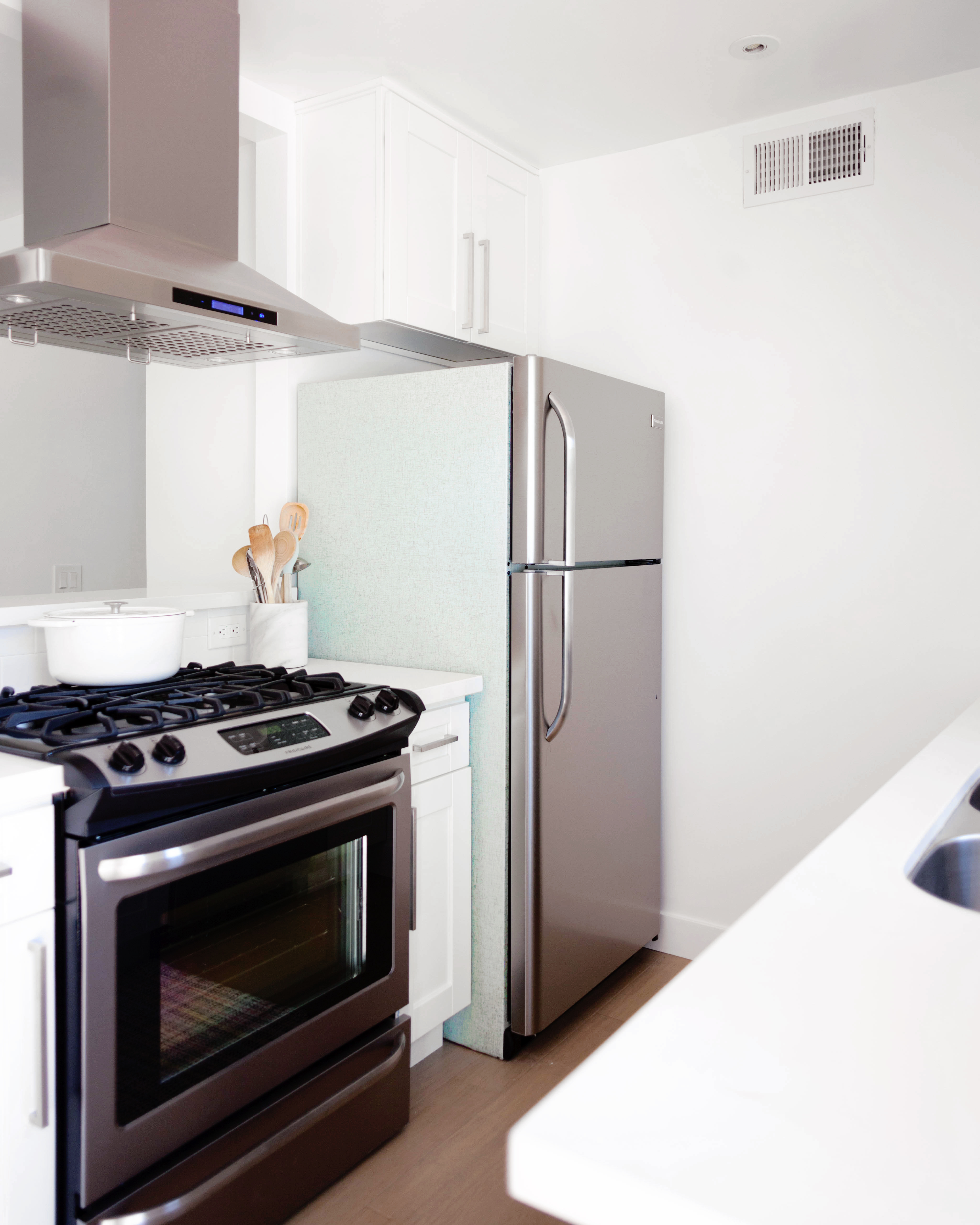 Use peel and stick wallpaper to cover a refrigerator 2.jpg