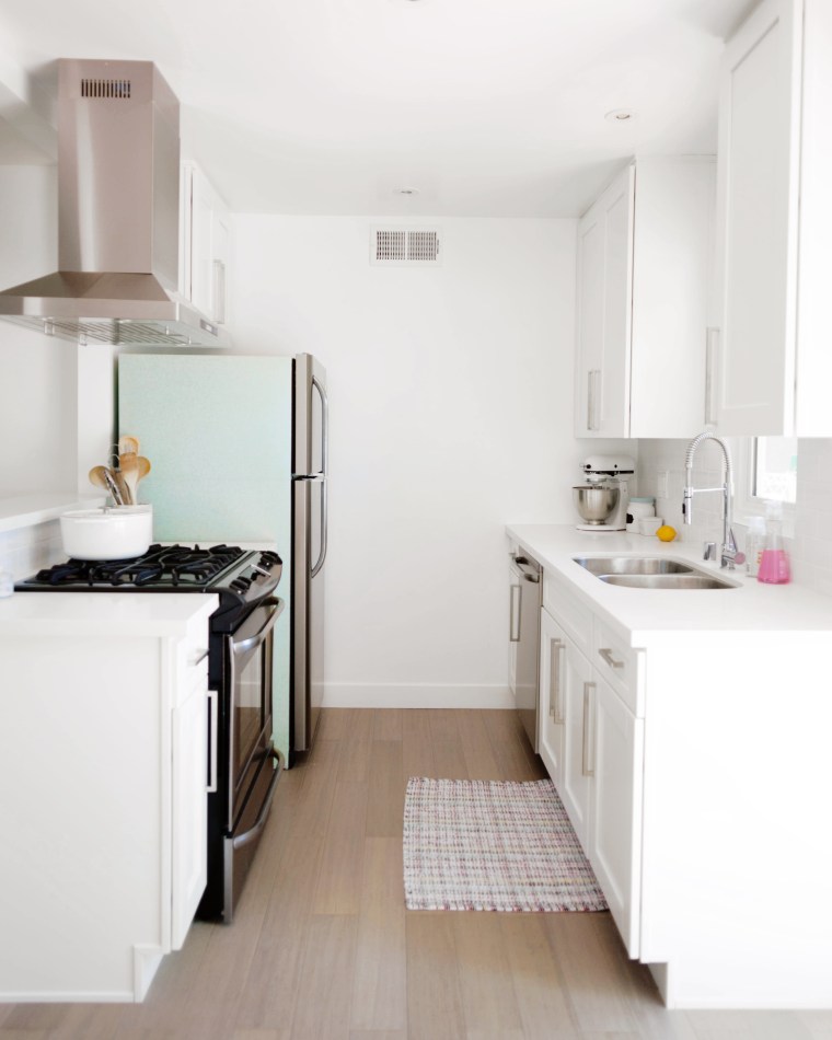 Use peel and stick wallpaper to cover a refrigerator 3.jpg