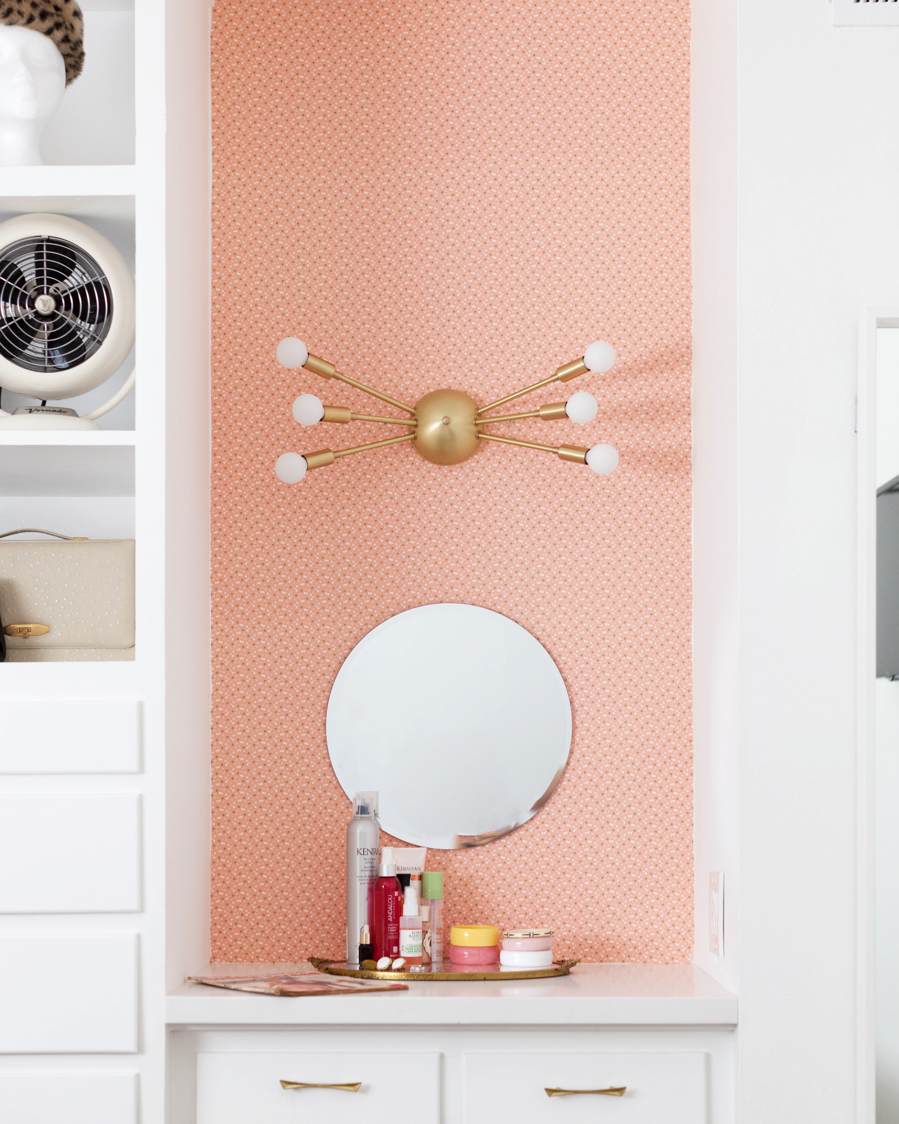 Vintage vanity with sputnik light from Lucent Light Shop