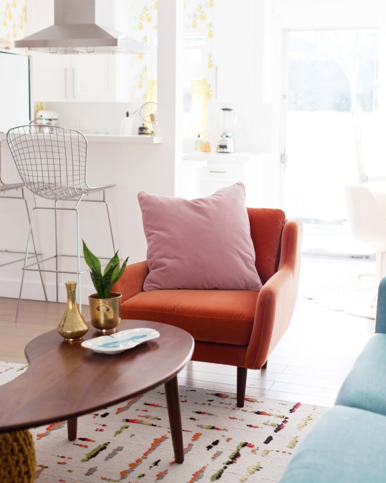 Persimmon Orange Velvet Matrix Chair from Article with Blush Pink Lucca Pillow